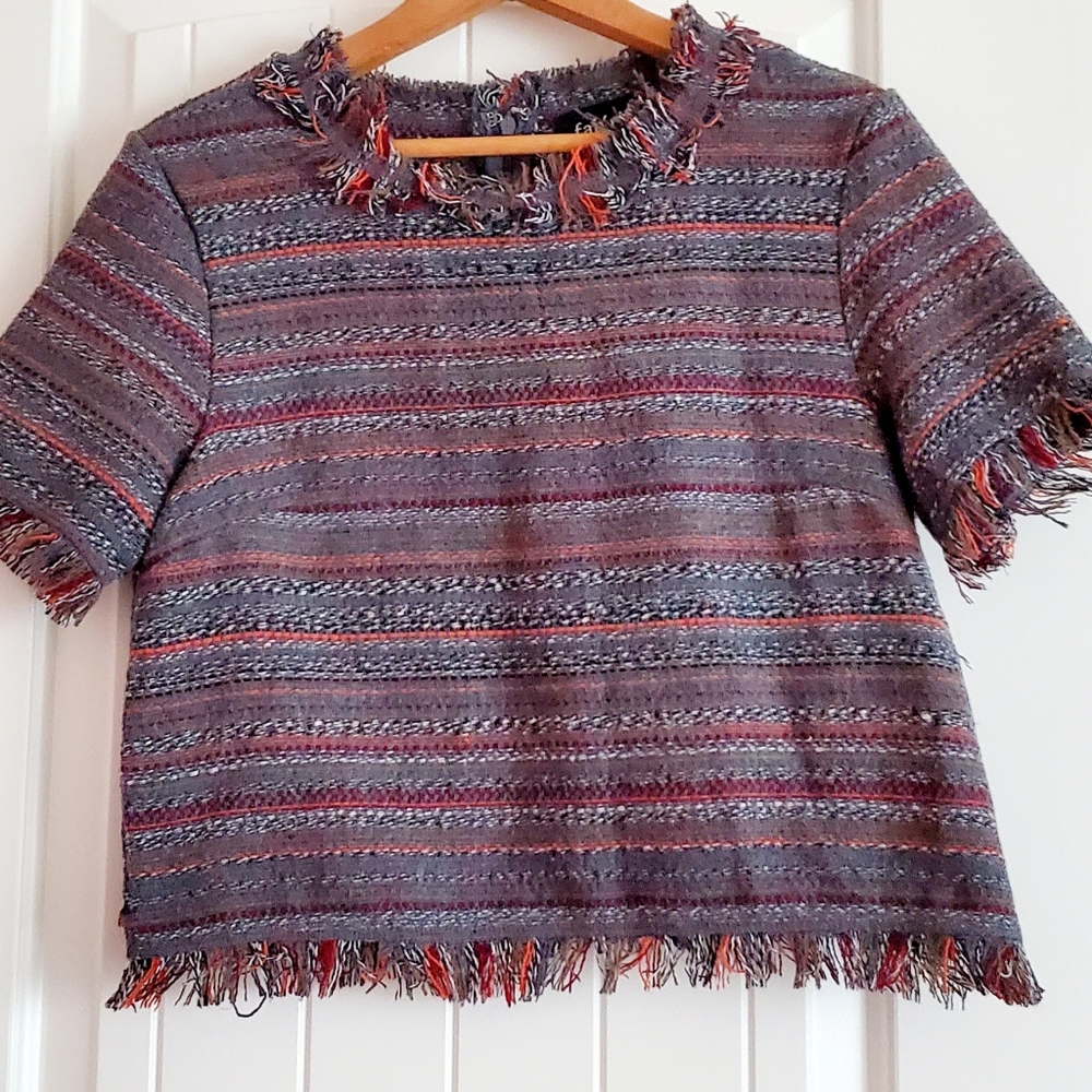 Fabrik knit cropped blouse with fringe hem